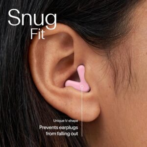 pink silicone ear plugs in a woman's ear